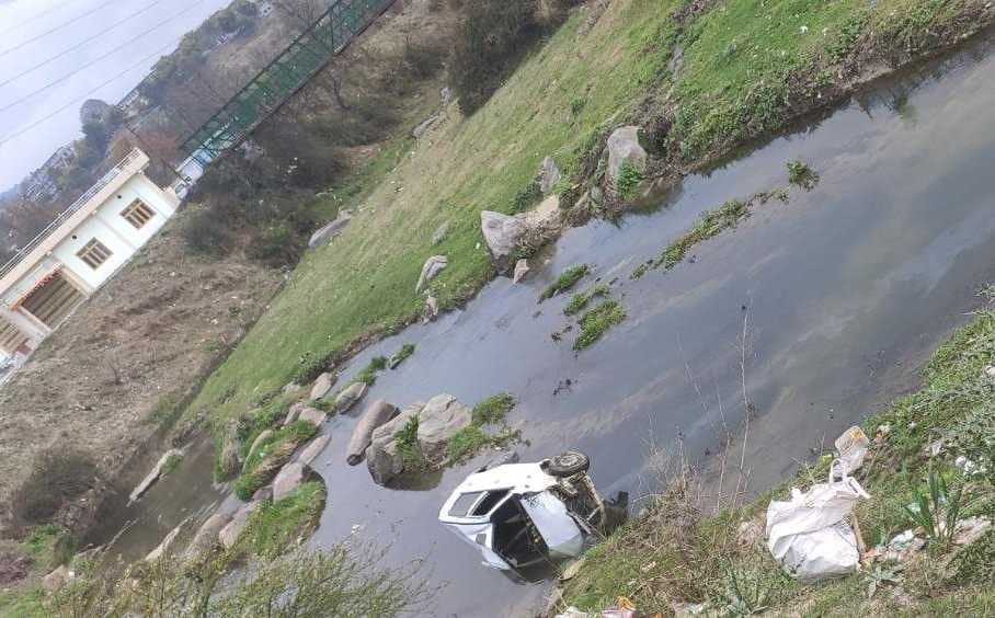 Car falls in river to avoid checking, two injured