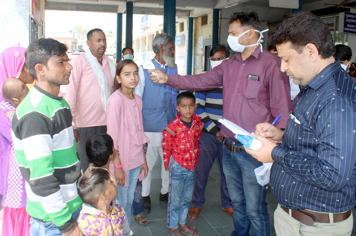 corona virus fear : two trains comes in station