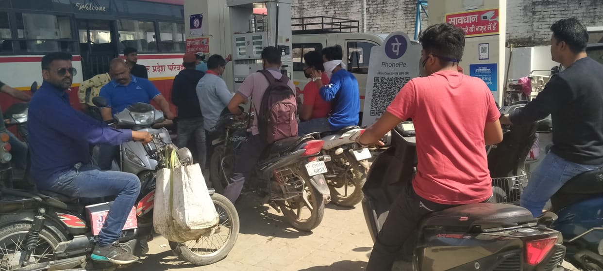 Crowd thronged the market and petrol pumps