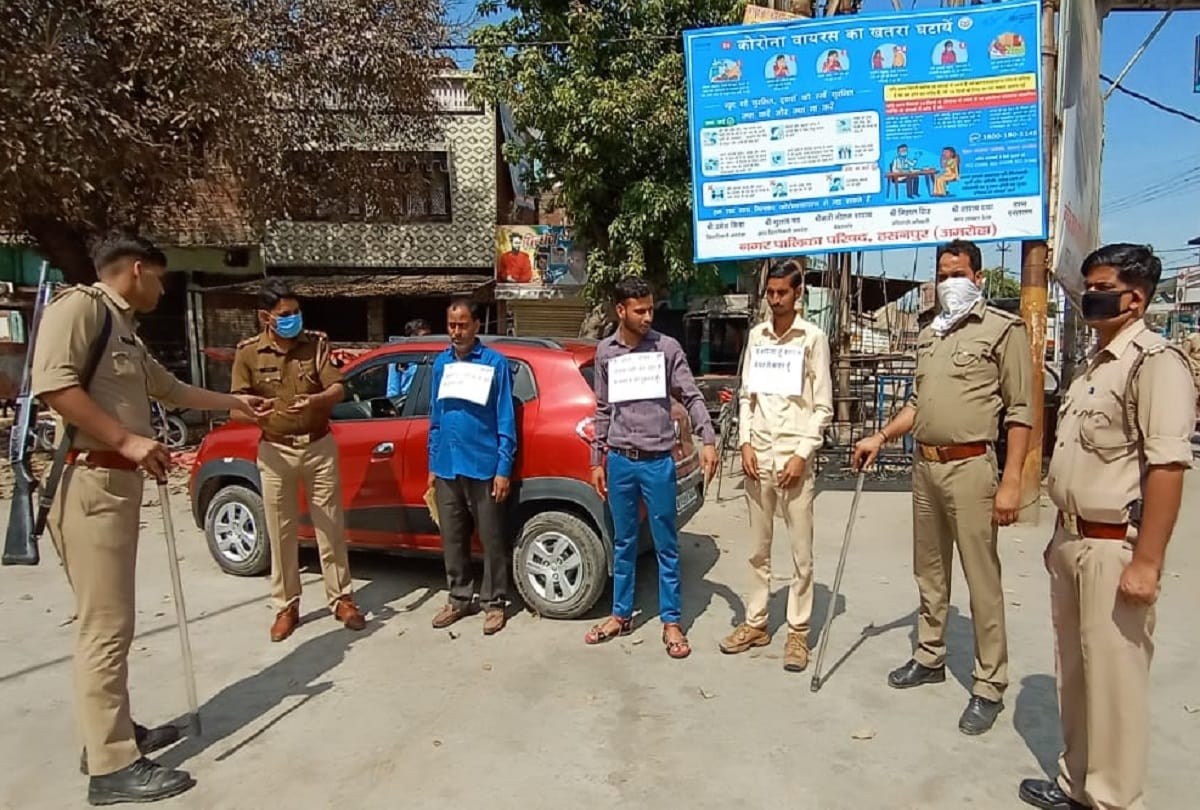 lockdown in india UP amroha police viral photos of accused who break rules of lockdown with special pamphlet