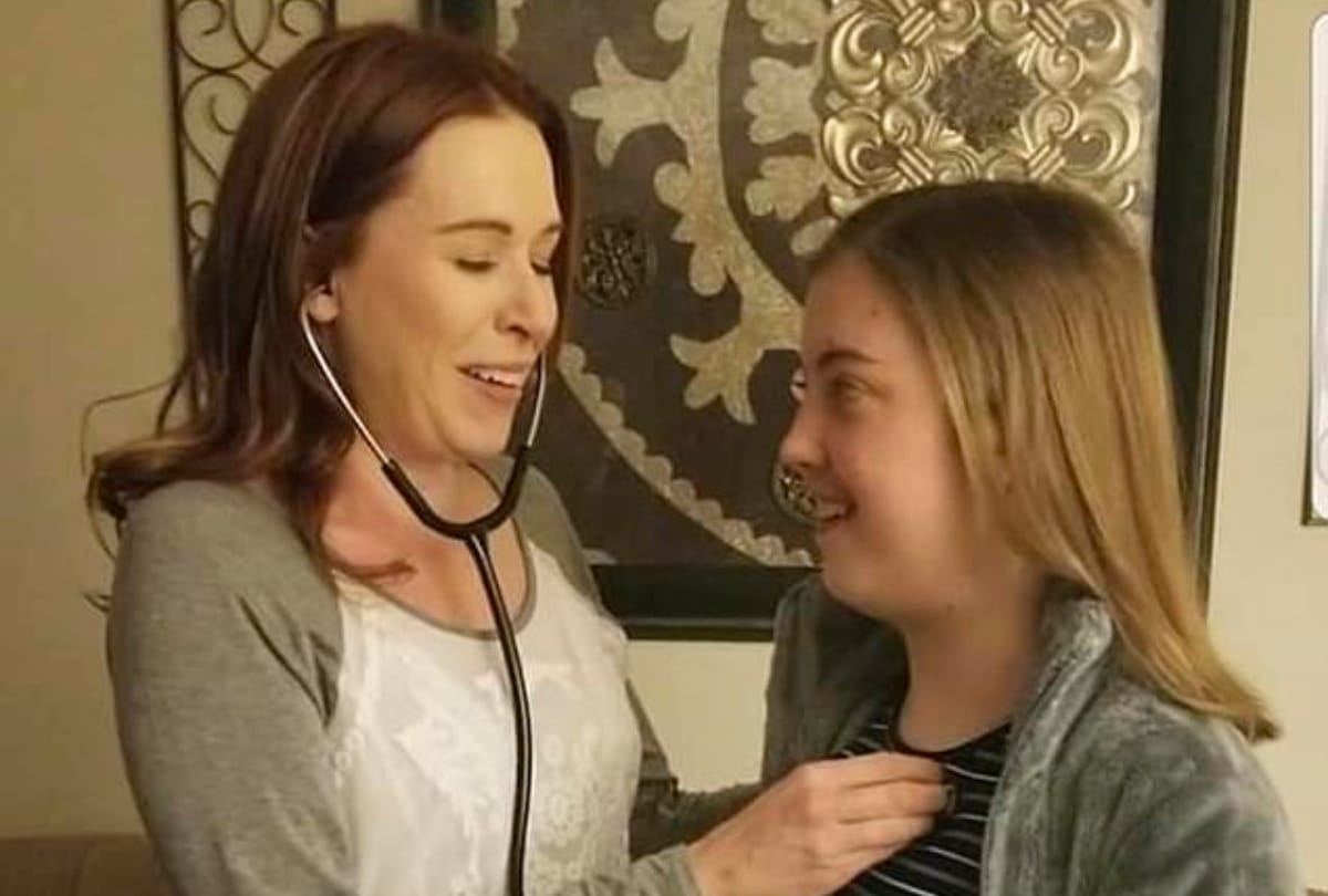 amazing mother listen her daughter heartbeat after one year death