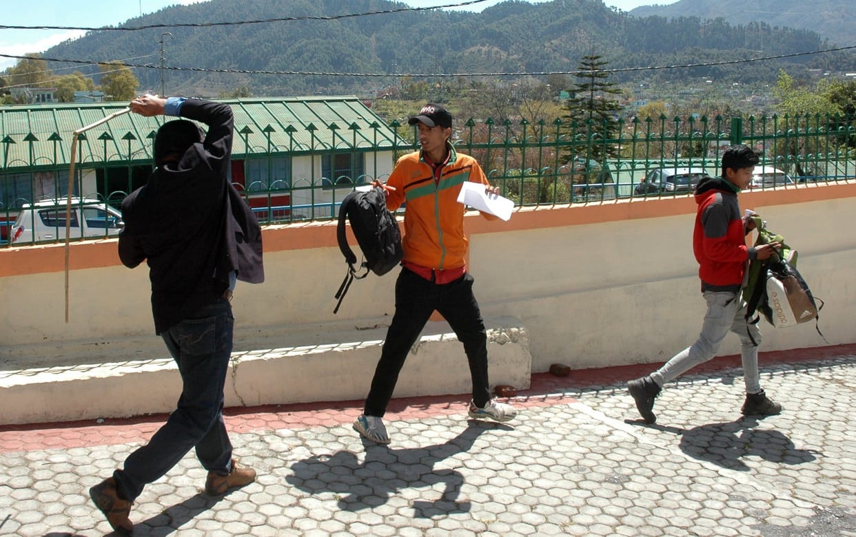 Police cracked sticks on people who roam needlessly