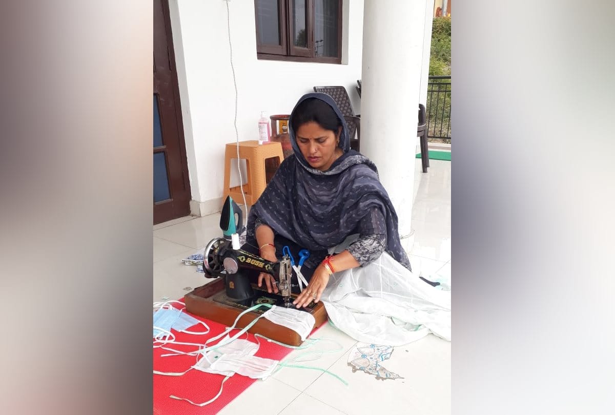 BJP MLA Kamlesh Kumari making masks with sewing machine at home in Bhoranj in Hamirpur in Himachal Pradesh