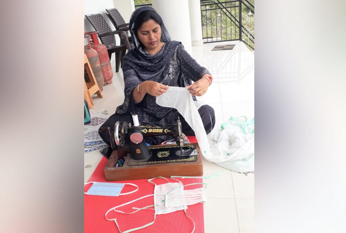 BJP MLA Kamlesh Kumari making masks with sewing machine at home in Bhoranj in Hamirpur in Himachal Pradesh