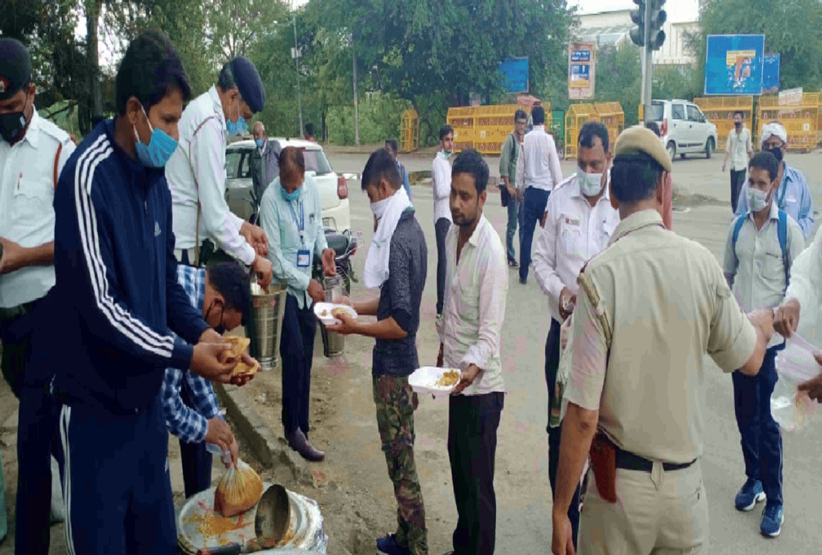 corona delhi workers start delhi to bihar journey by foot police stop them provide ration