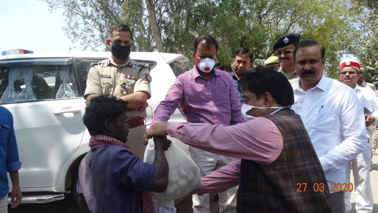 Distribute 10 days of food items and masks to 32 families