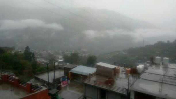 Rain in the region, mist on the mountains