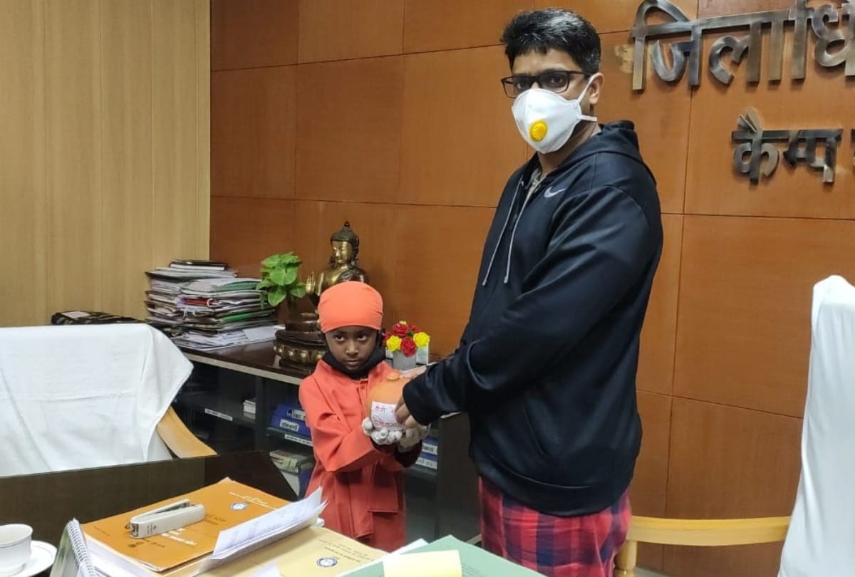 Little boy handed over his piggy bank to DM For coronavirus help