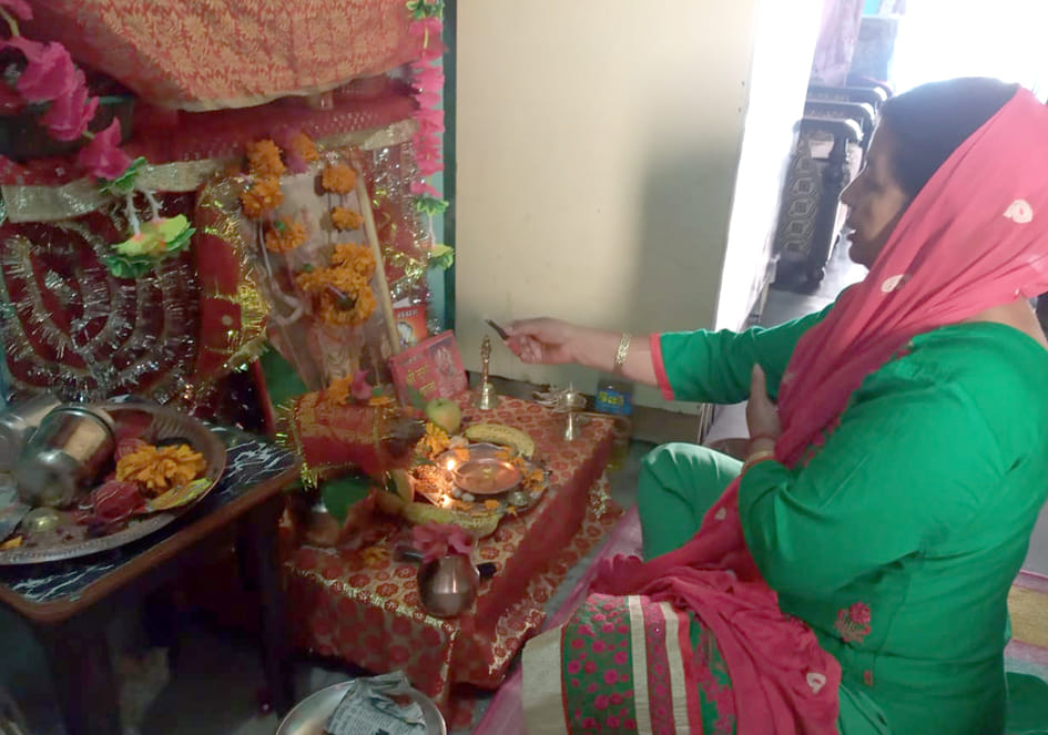 Skanda Mata sits on lotus seat