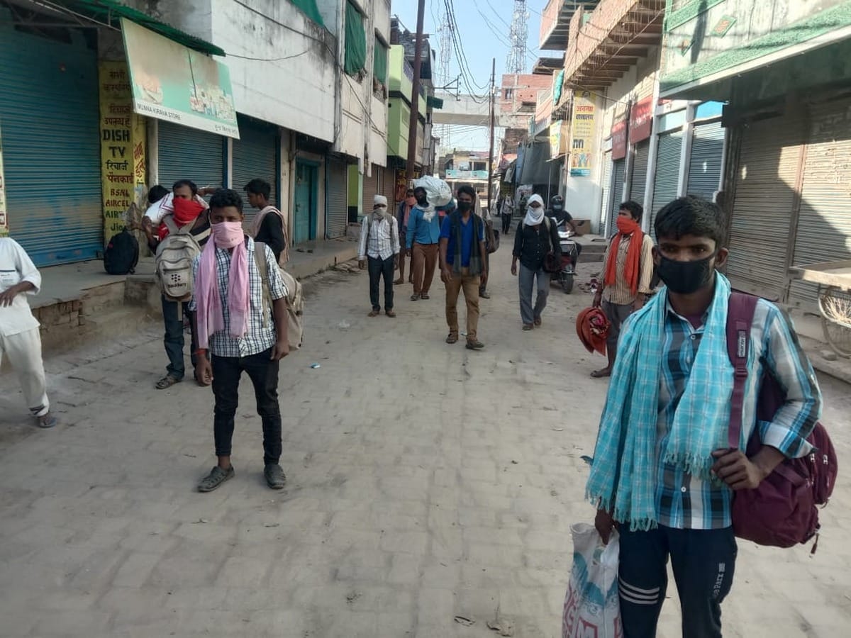 lockdown migrant worker laborers walking home to up bihar in varanasi news dist