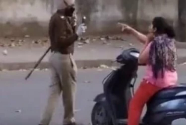 The woman abused the police officer when she stopped going to curfew