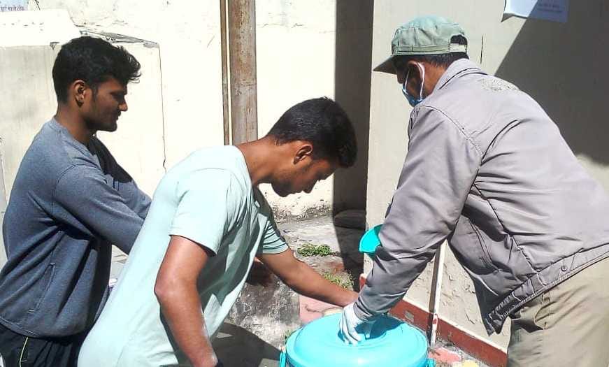 No sanitizer in district hospital, people washing hands with soap