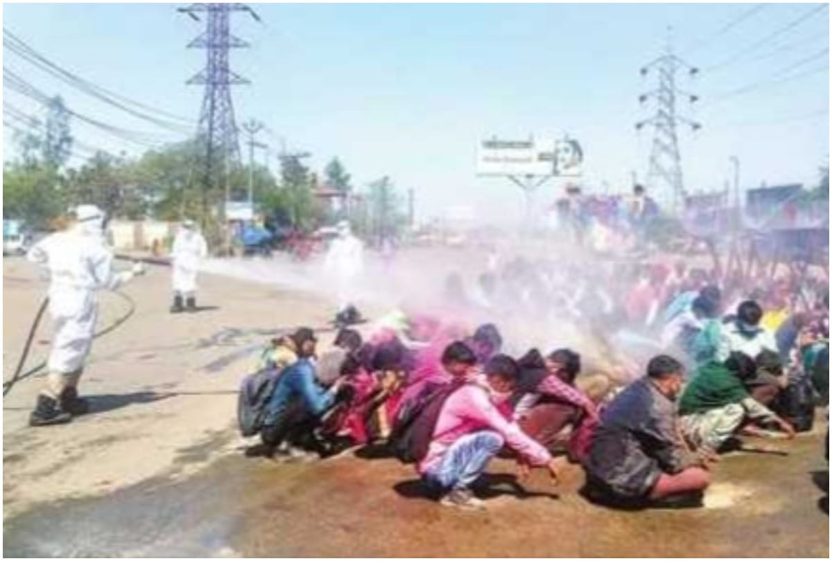 bareilly reports of spraying of insecticides on migrant to sanitize them akhilesh yadav attacks government