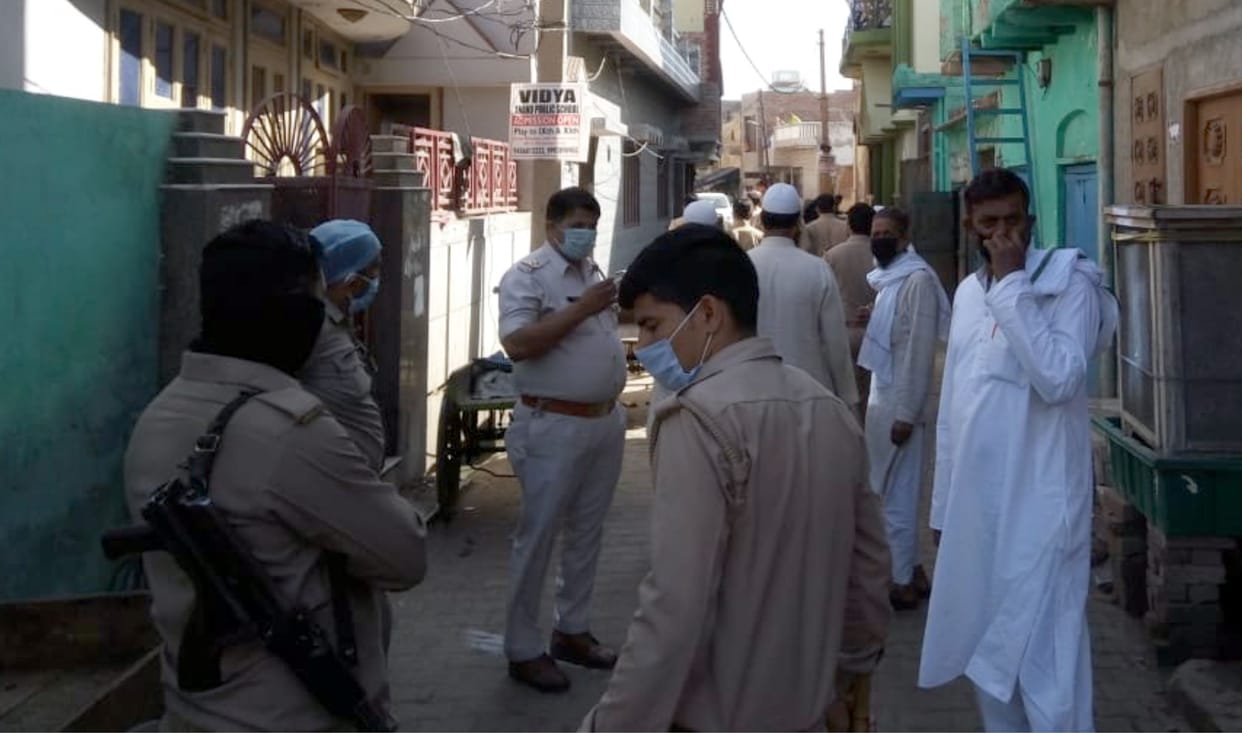 Policemen surrounded
