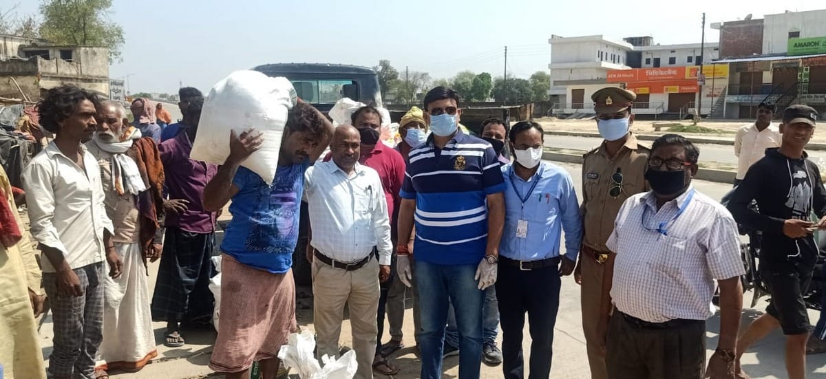 Varanasi airport officials distributed ration to the needy