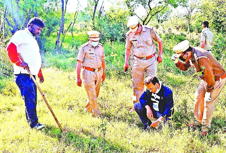 Forest department employees walking around with hand sticks to catch leopard