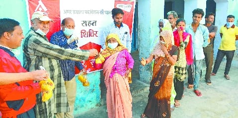 The needy received food packets and the smile on their faces