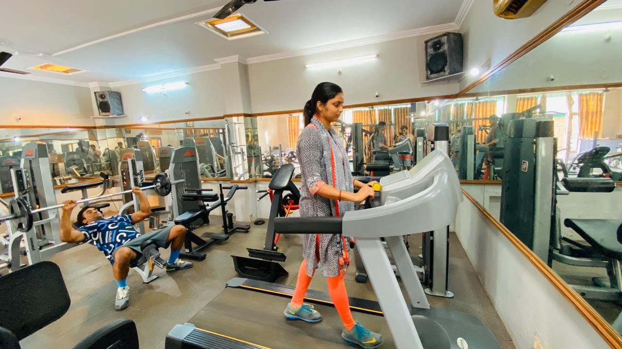 Somebody playing guitar in lockdown and some sweating in gym in varanasi