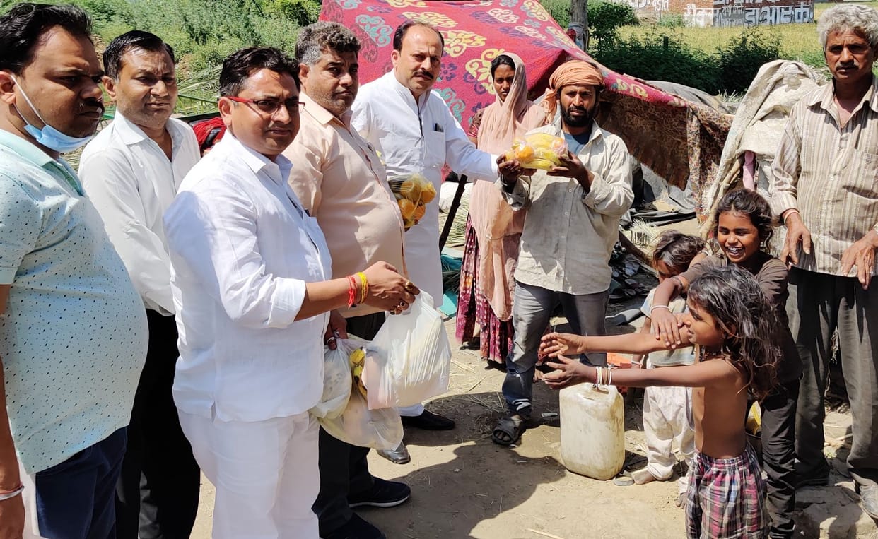 Distributed food and grains to the needy