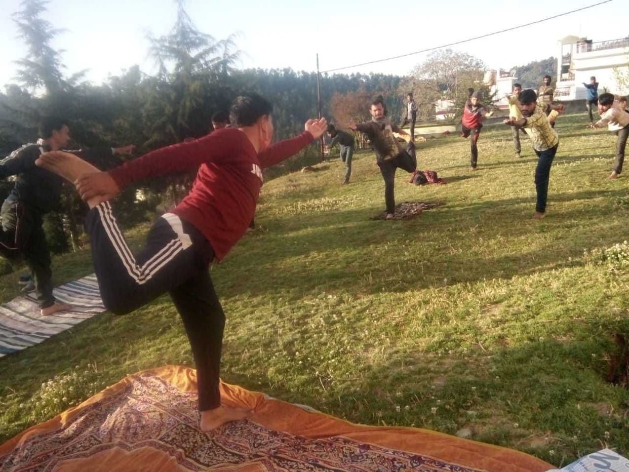 Kotial couple learning yoga in Quarantine Center
