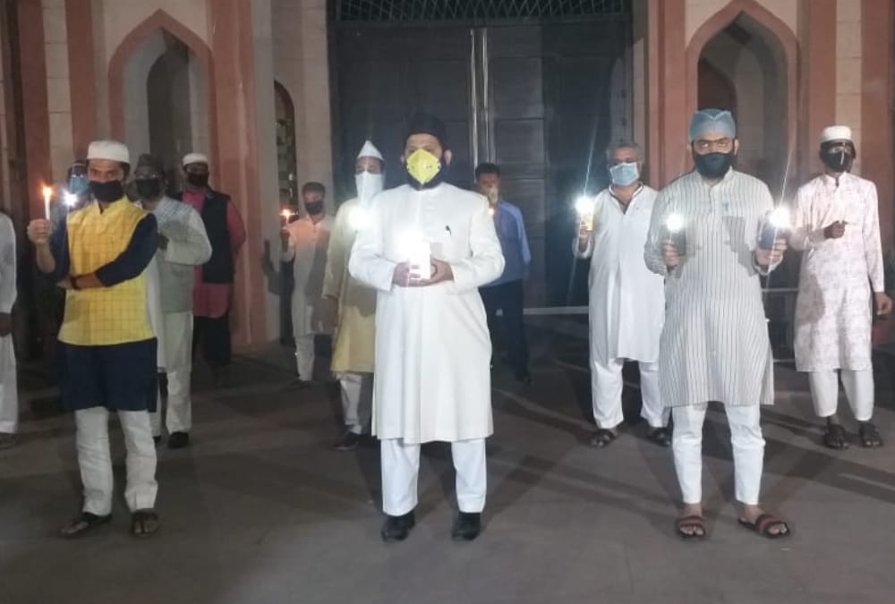 People light diyas in hope of fight against corona.