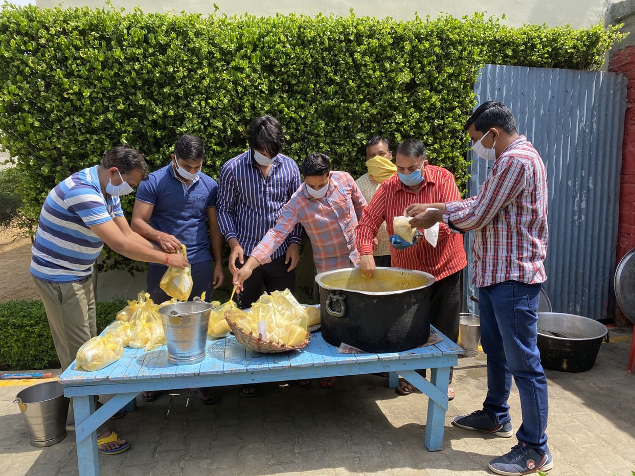 Food packets delivered door to door to the needy