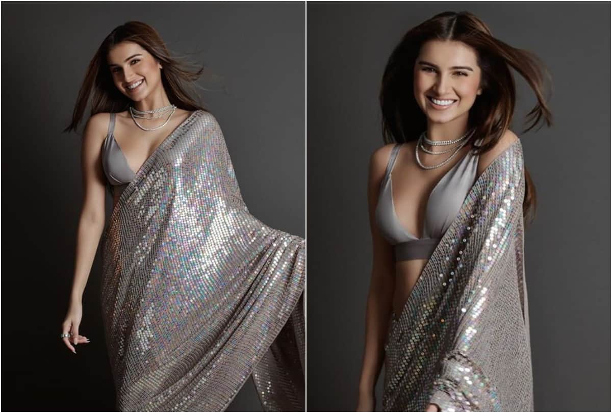 tara sutaria looks stunning in a cherry red pre draped satin silk saree pictures goes viral