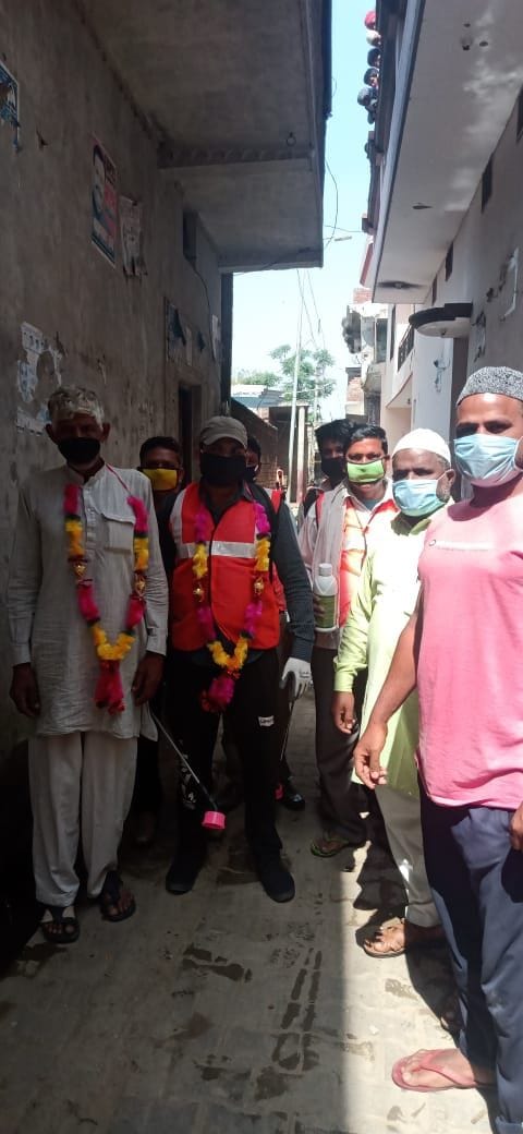 Sanitation workers honored with flowers