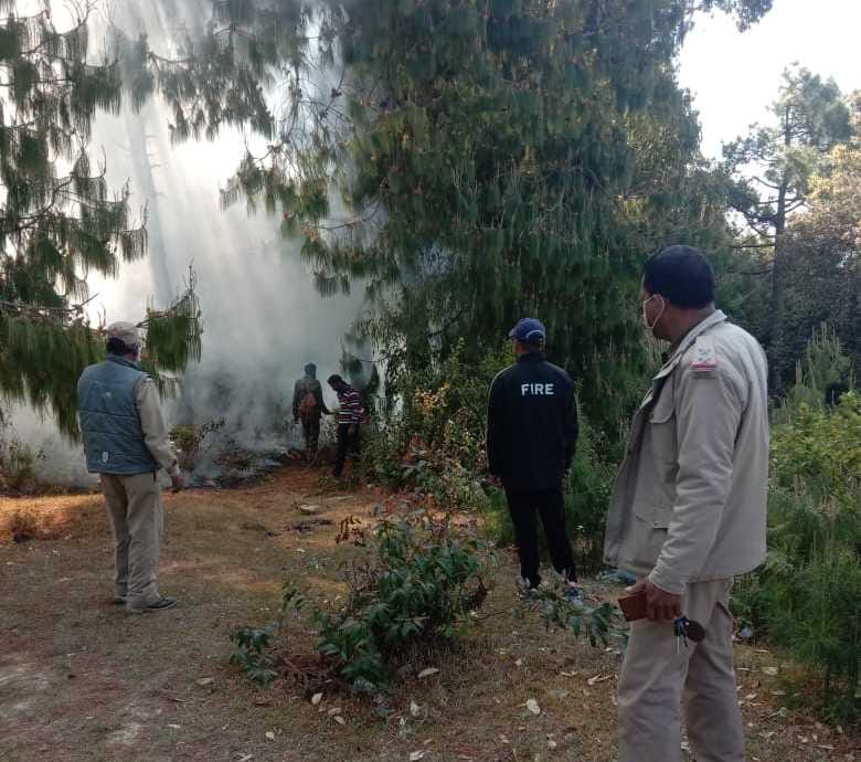 Fire fighting team rushed to extinguish the control burning as a claim