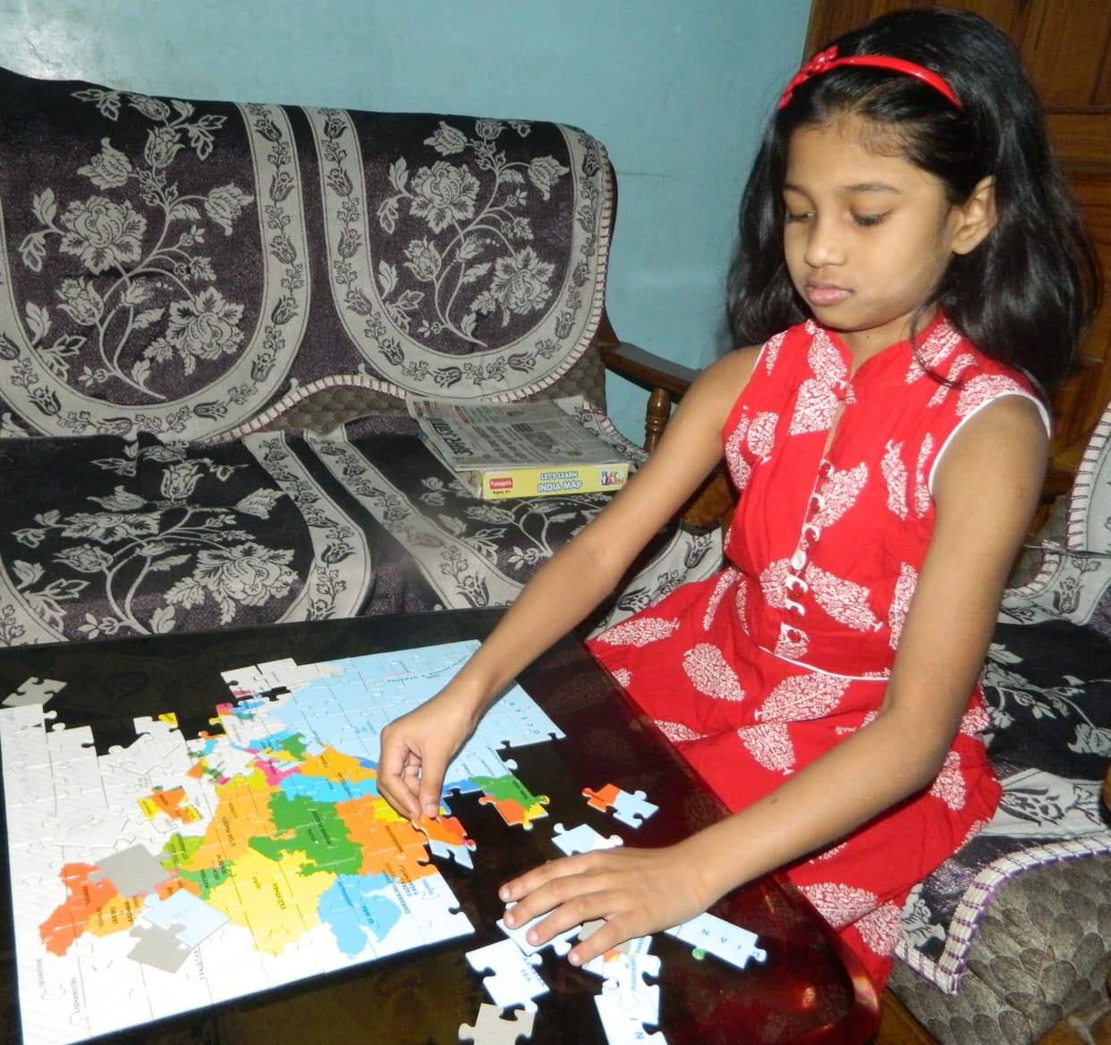 Children studying country map