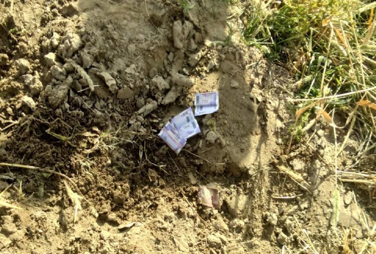 two bikers threw currency notes after spitting on them in Iglas village