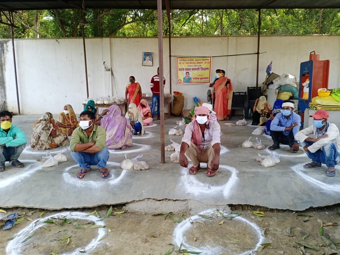 Ration and lunch packets were distributed to the needy