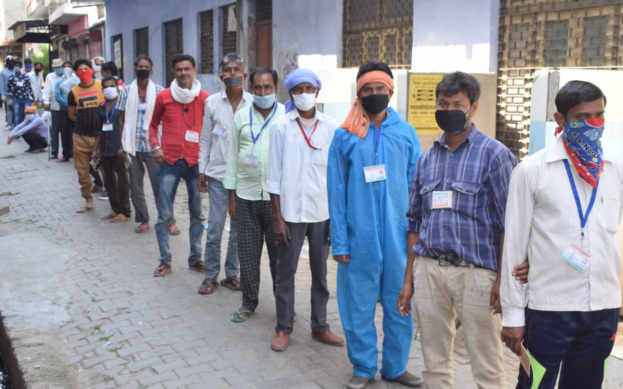 bank worker worried after seing croud outside