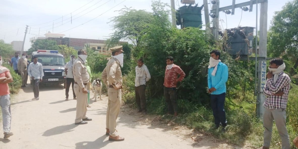People who came to get straw stopped outside the village
