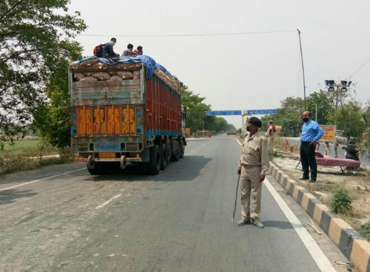 labours hidden in garlic loaded truck