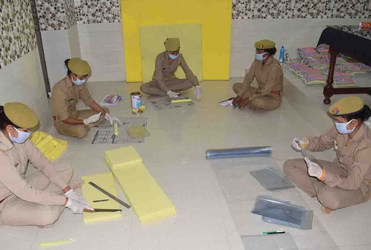 Women policemen making face shield in Hardoi police line