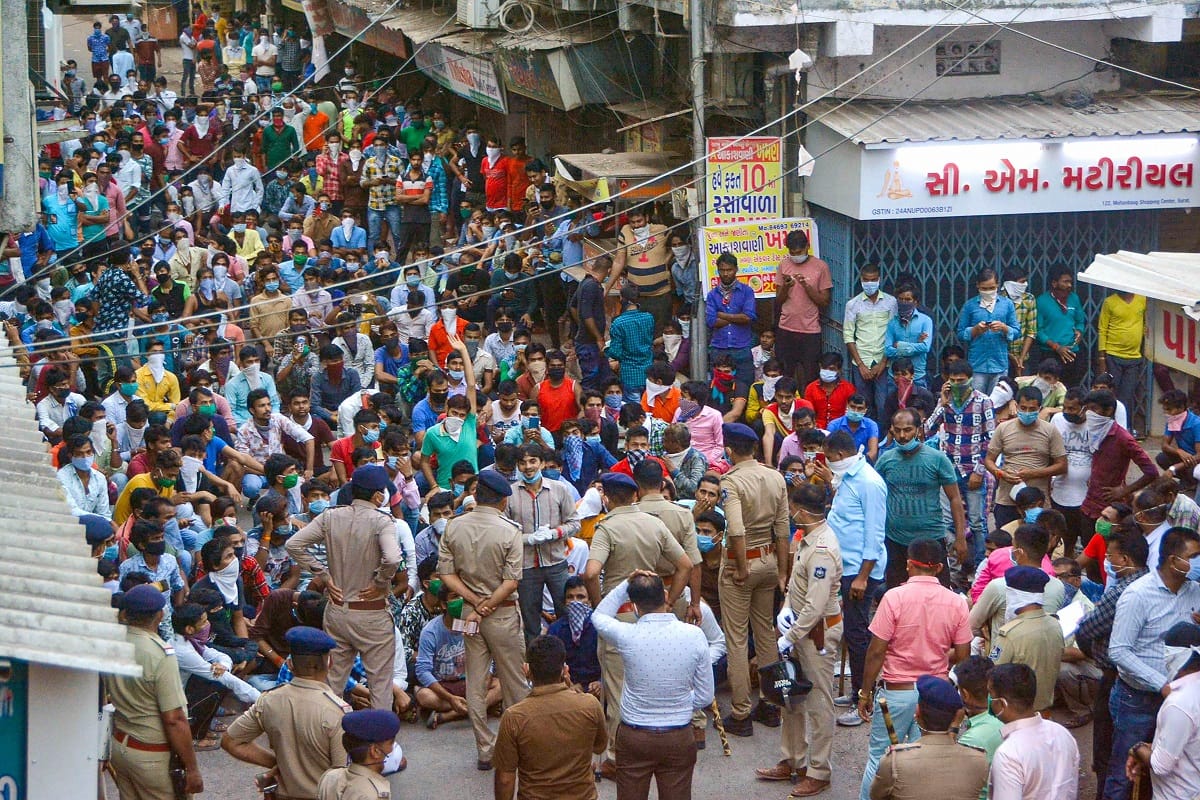 On second day in row, migrant workers gather on Gujarat Surat roads