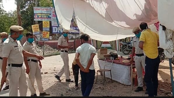 Home Guards rushed by bike riders, showing challan of Rs 29500