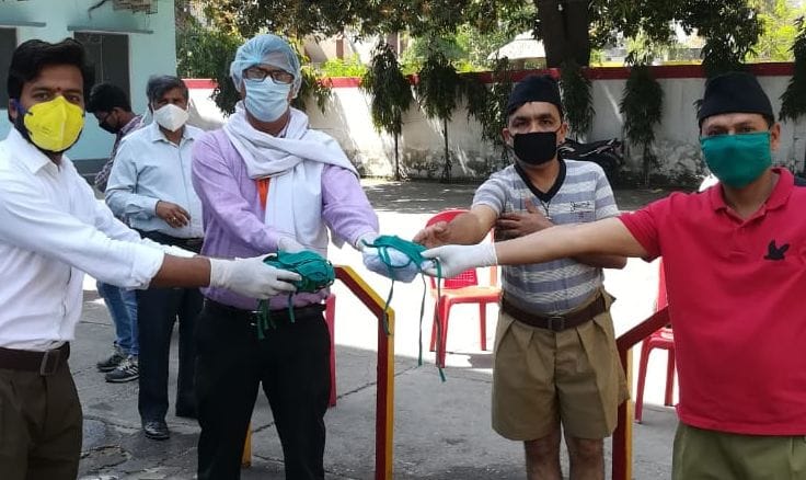 RSS workers presented masks