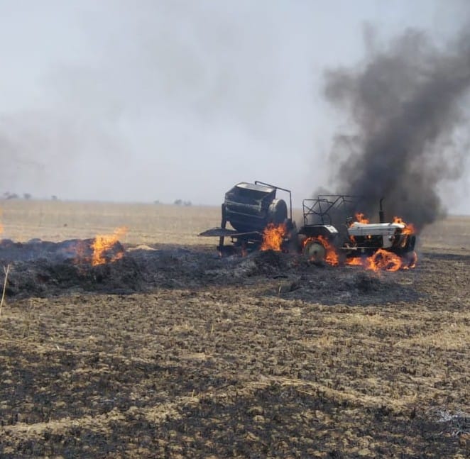 Tractors and crop burns due to threshing spark fire