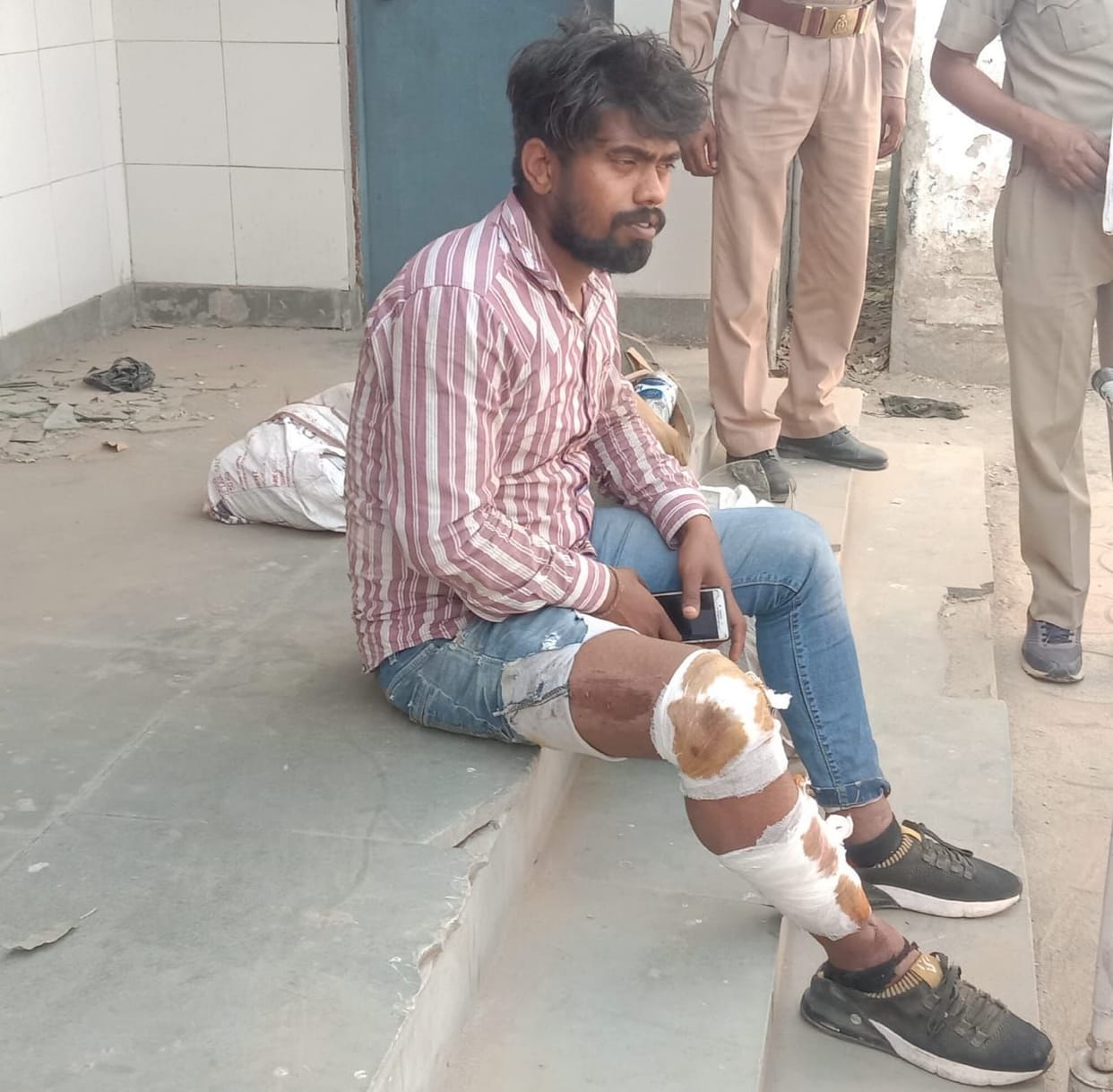 Bike collides with divider, father dies, son injured