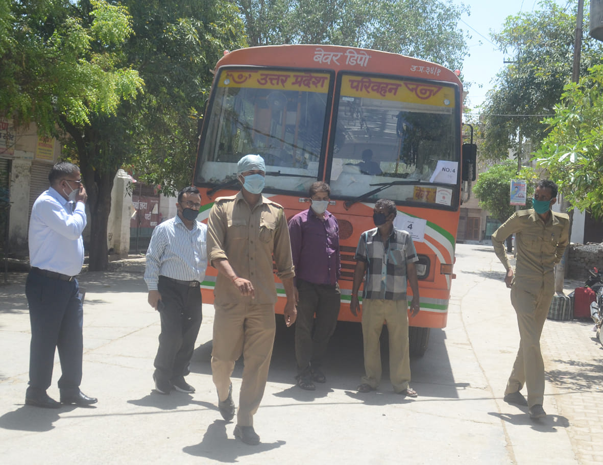 Three students and two families return home from Kota