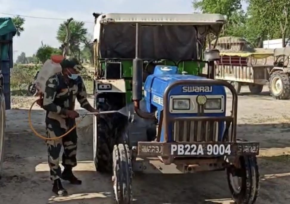 BSF Jawans sanitizing the agriculture equipment at indo pak border villages