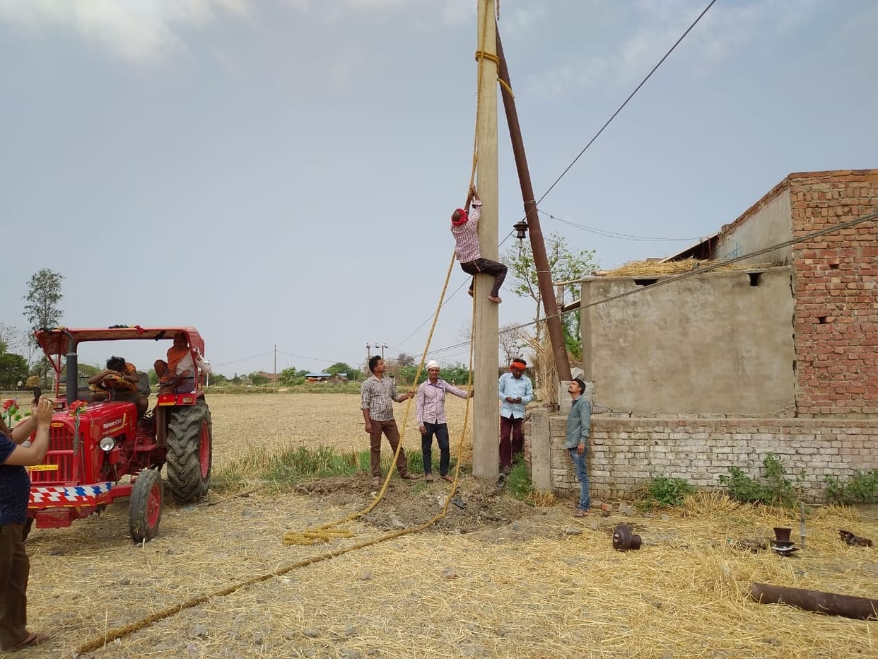 Pole broken by storm, 100 village lights blazing