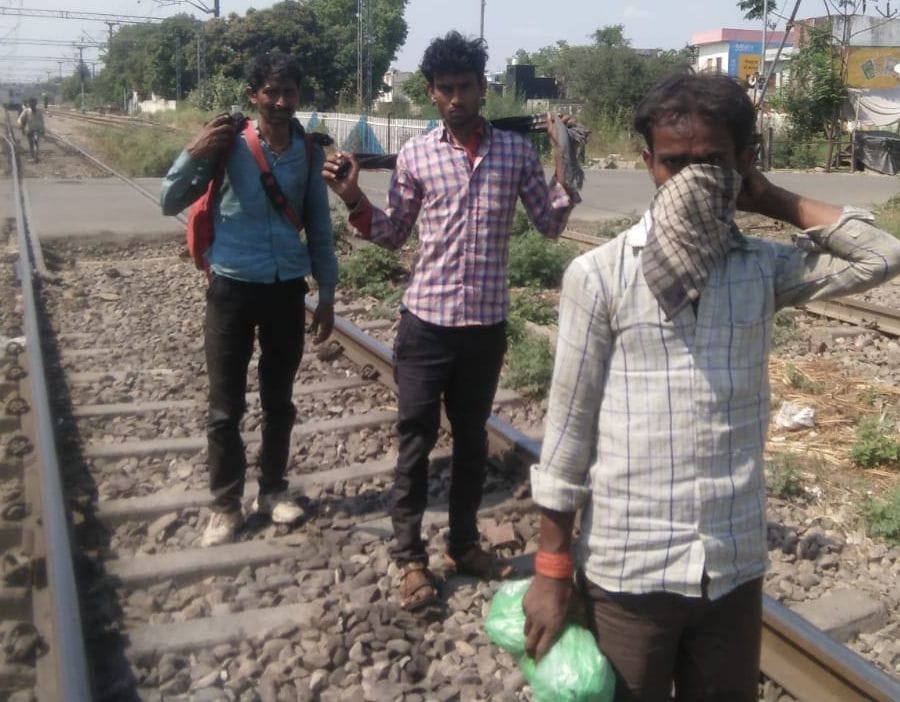 Fed the workers walking on the railway tracks