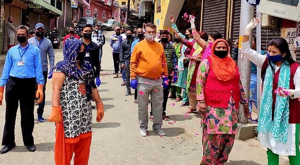 Flower rain on Corona Warriors in Dharchula