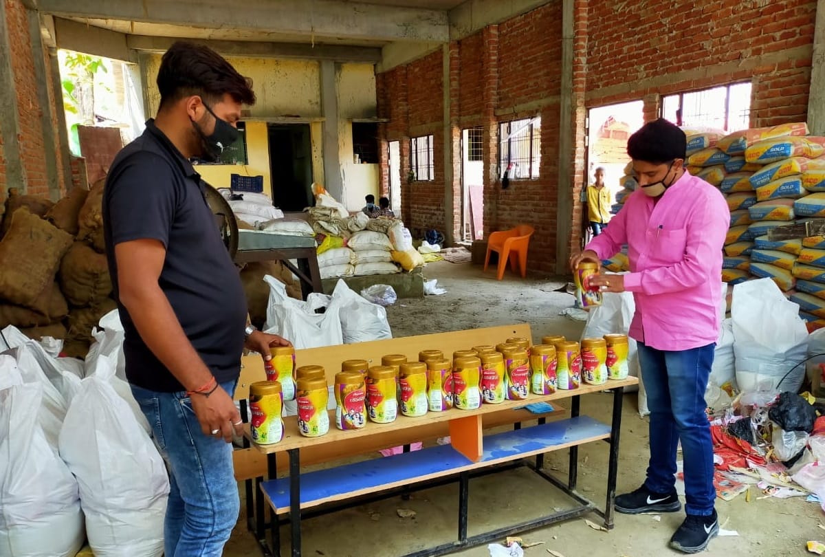 Lakshya Education Academy is distributing Chyawanprash to the elderly