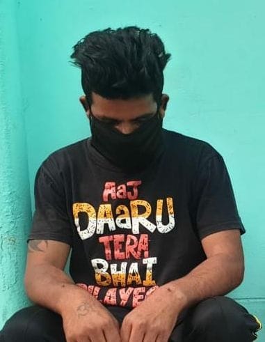 Today your brother will get alcohol He was wearing a printed T-shirt and was selling alcohol