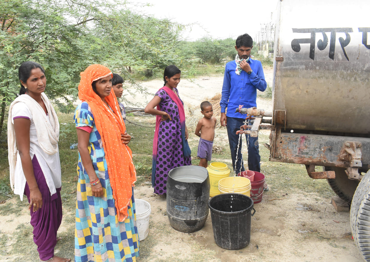 Water tanker arrived, happiness on face