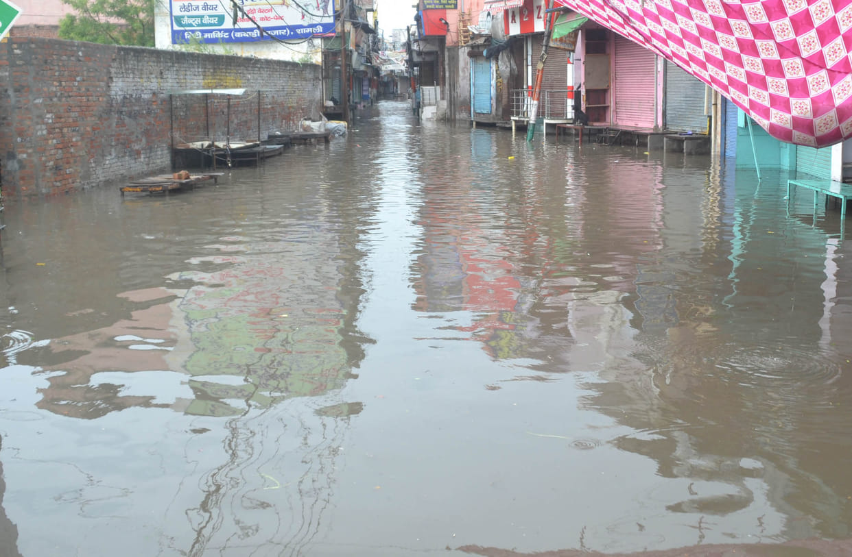 The streets are submerged due to rain, harvesting affected